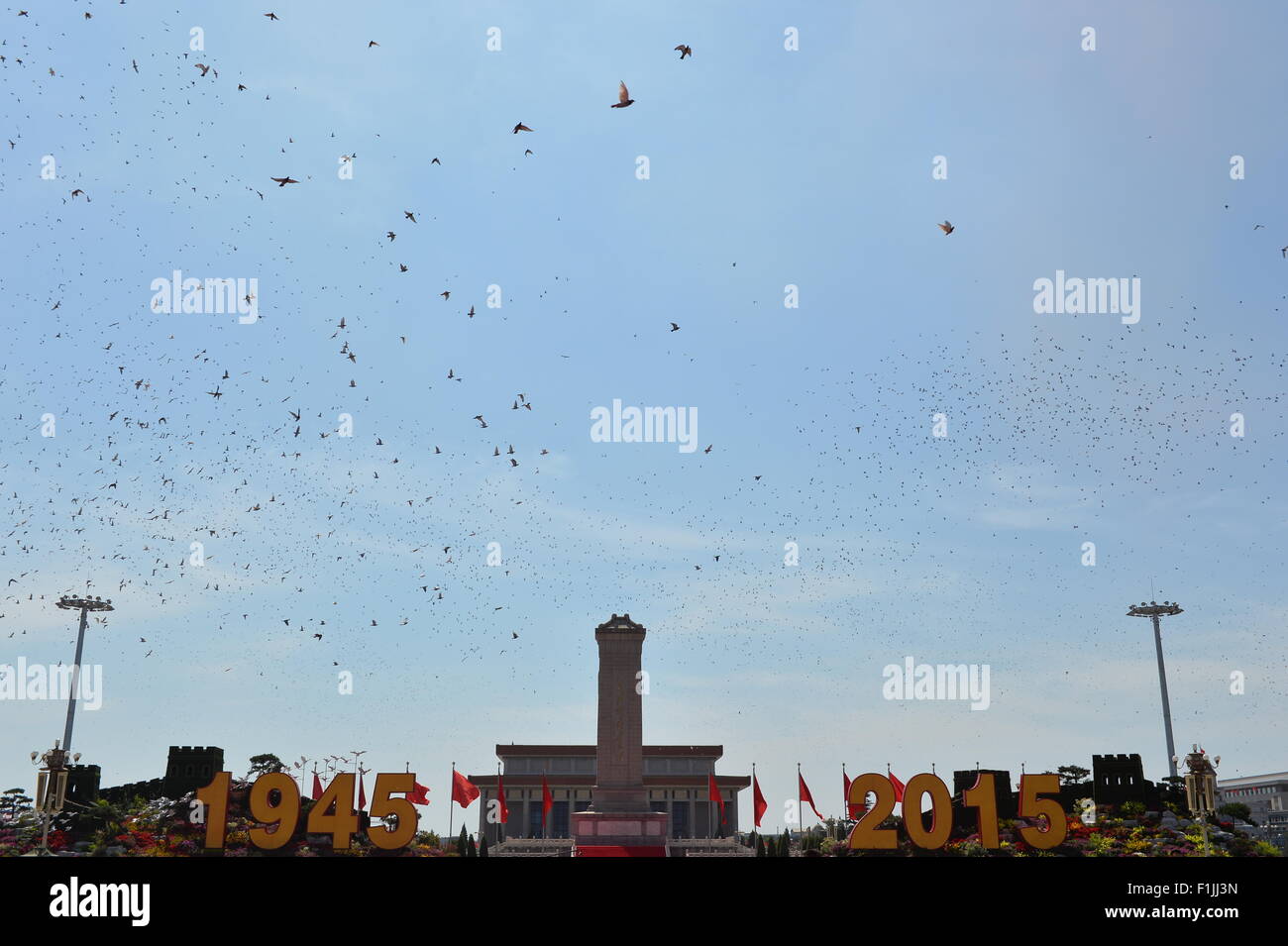 Beijing, China. 3rd September, 2015. Pigeons are released at the end of ...