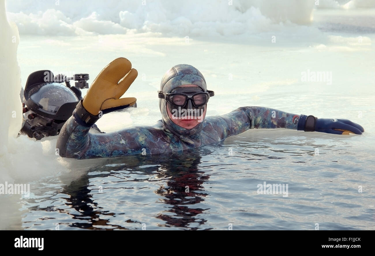 White Sea, Arctic, Russia. 15th Oct, 2014. Freediving under ice in