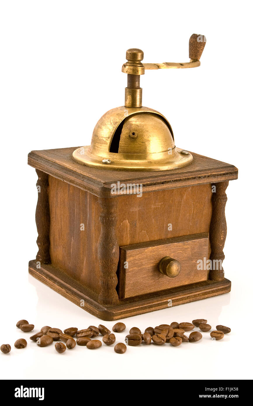Old coffee mill with coffee beans isolated on white Stock Photo Alamy