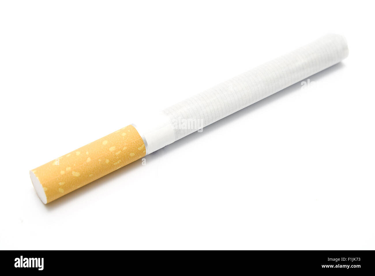 Single cigarette isolated on white Stock Photo