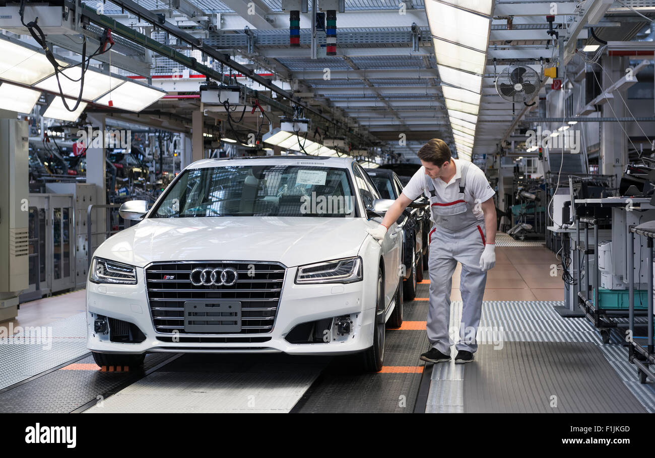 Audi AG employee conducting the first run of an assembled A8 sedan, production line, Audi factory in Neckarsulm Stock Photo