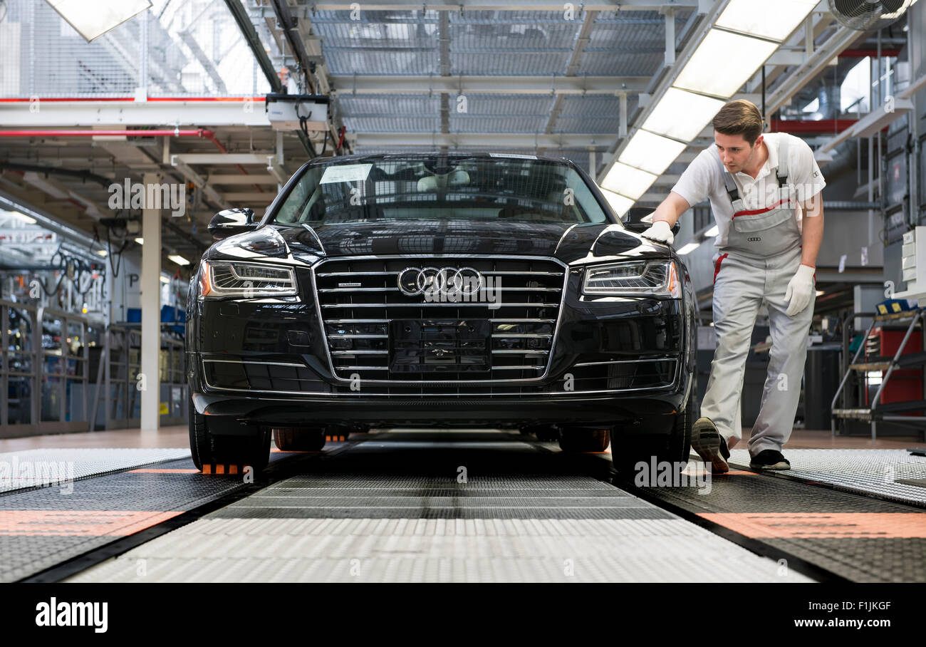 Audi AG employee conducting the first run of an assembled A8 sedan, production line, Audi factory in Neckarsulm Stock Photo