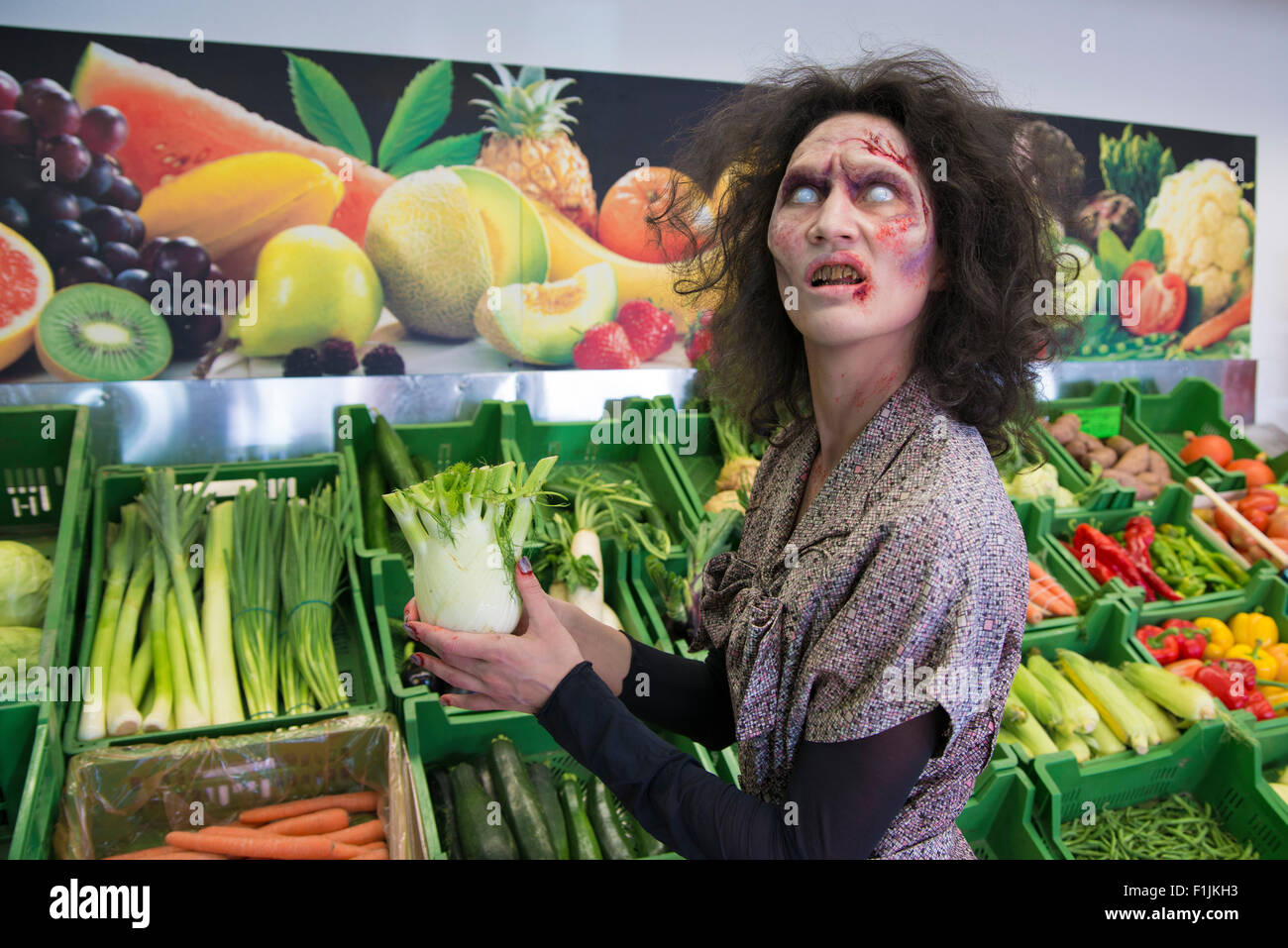 Zombie buying vegetables, scene from zombie comedy short film Brain Freeze Stock Photo