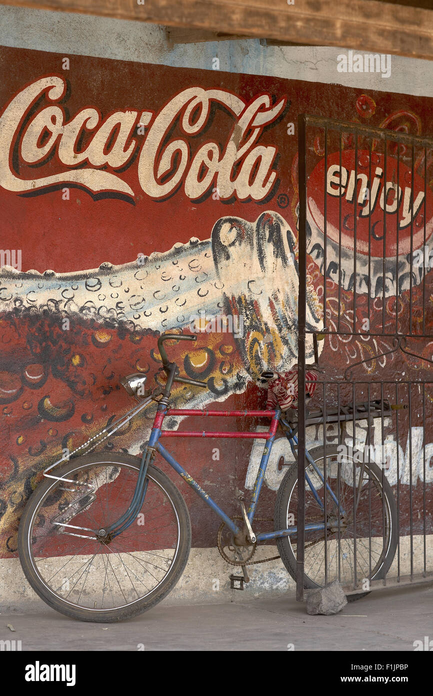 Bicycle and Coca-Cola sign, rural shop by the side of the road, Zimbabwe Stock Photo