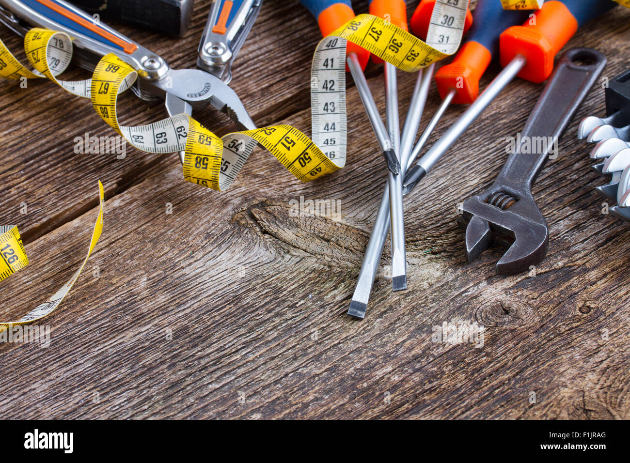 tools kit frame on wooden planks Stock Photo - Alamy