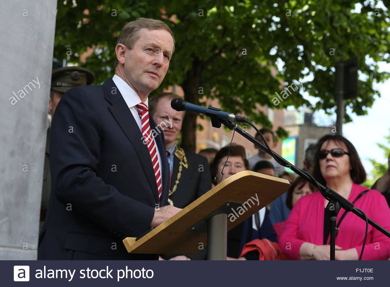 Irish Prime Minister Enda Kenny speaking at a memorial for victims of the Monaghan bombings in Dublin Stock Photo