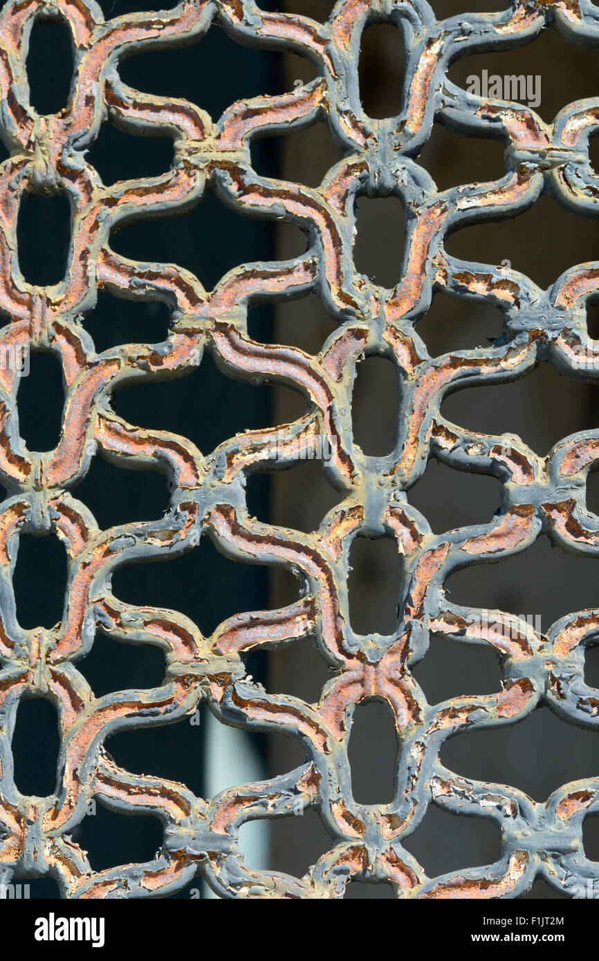 Rusted metal trellis pattern on door Stock Photo Alamy