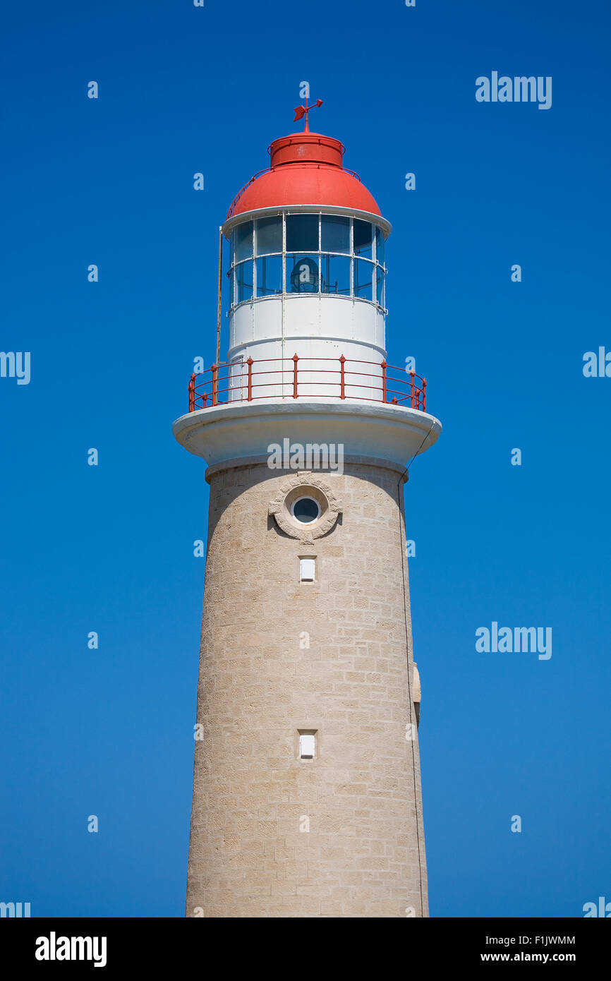 Lighthouse against clear blue sky Stock Photo
