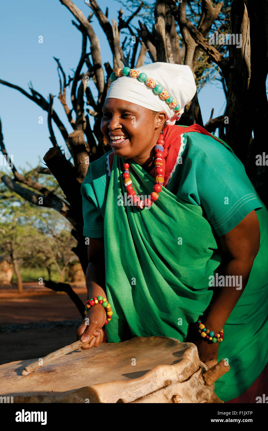 Pedi Woman drumming, Legends Lodges Entabeni Safari Conservancy Stock Photo