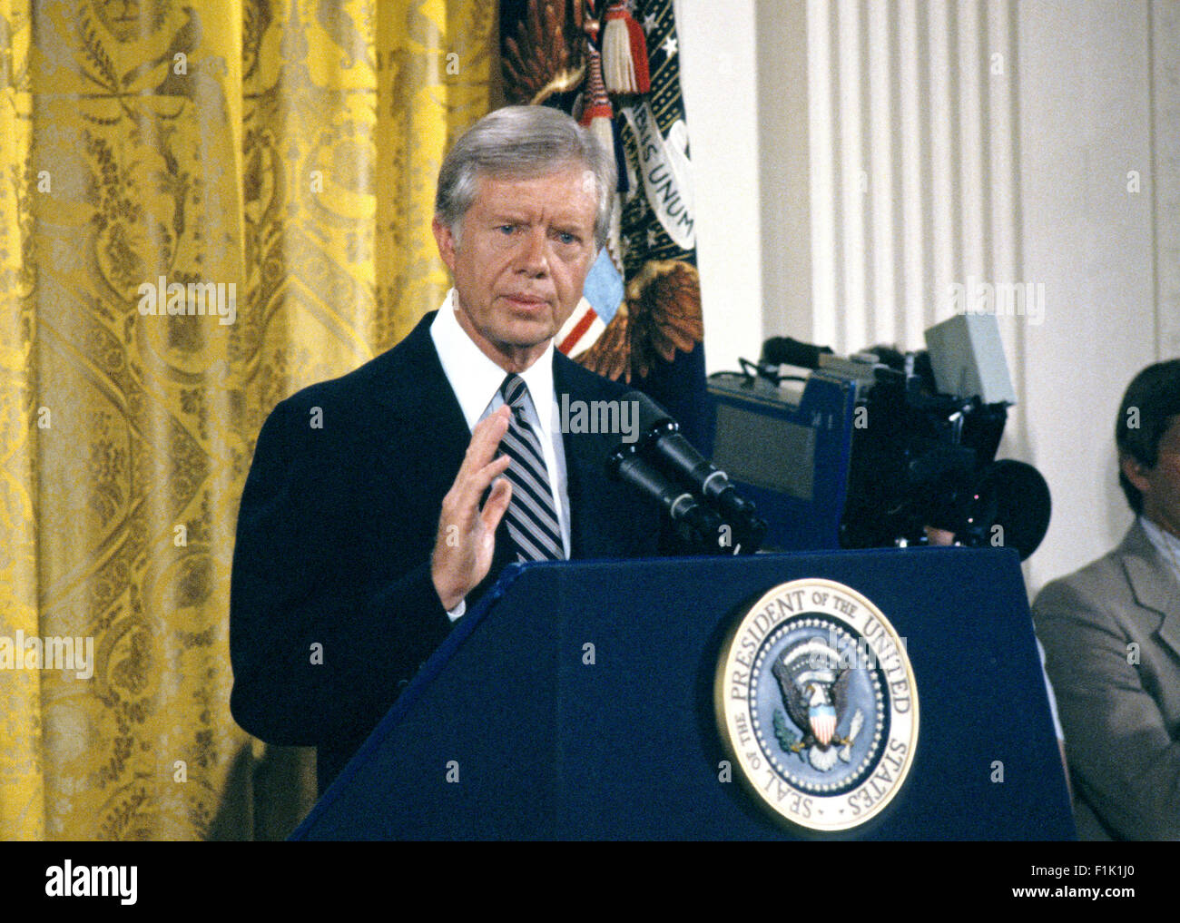 United States President Jimmy Carter holds a press conference in the East Room of the White House in Washington, DC on August 4, 1980. The President discussed the scandal surrounding his brother Billy. Carter said there was no impropriety in his brother's activities and insisted neither he nor any member of his administration broke any laws. The President went on to say his brother tried to free the American hostages being held in Iran through his dealings with the Libyans. Credit: Benjamin E. 'Gene' Forte/CNP - NO WIRE SERVICE - Stock Photo