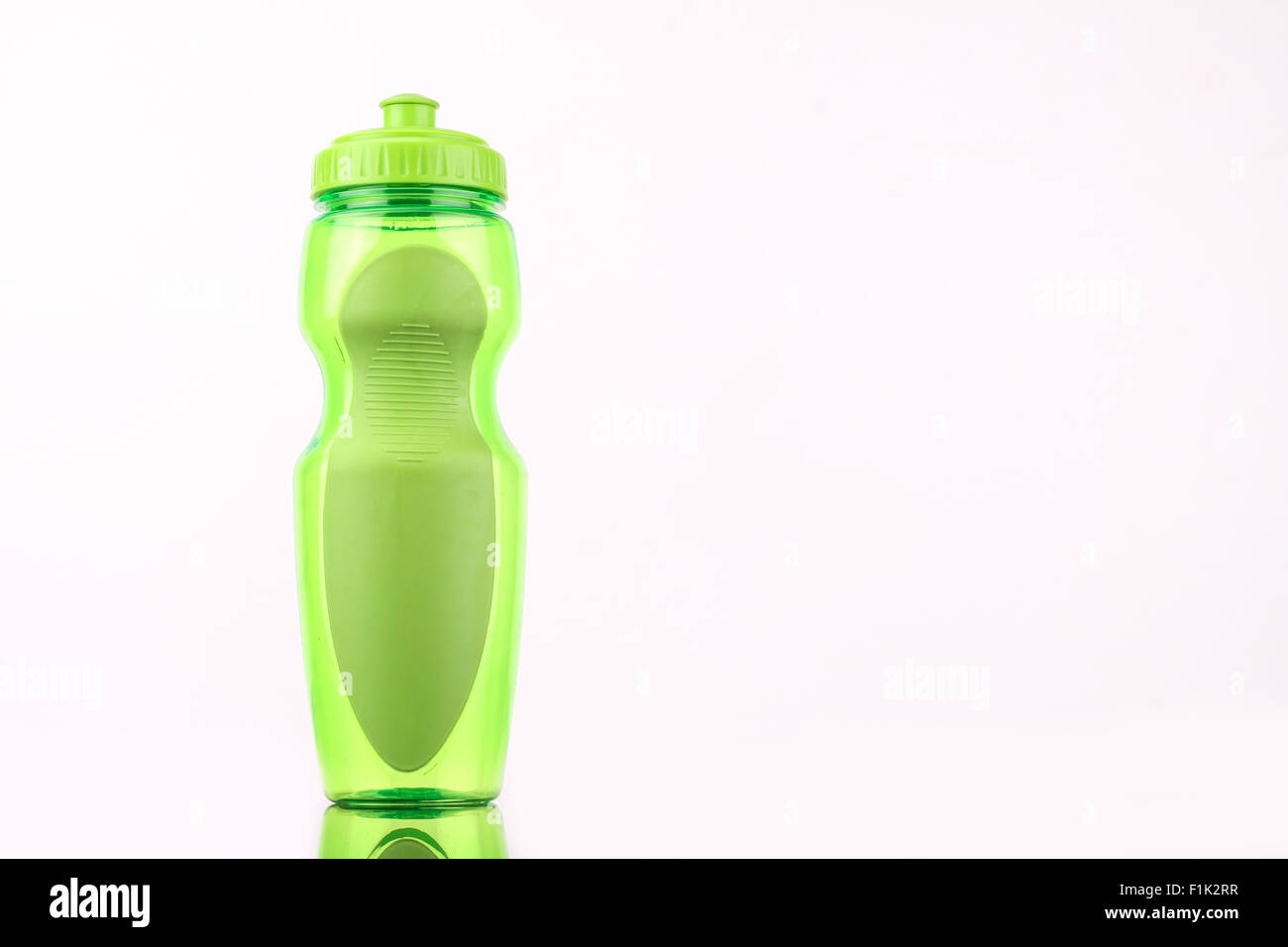 green bottle isolated on white background Stock Photo - Alamy