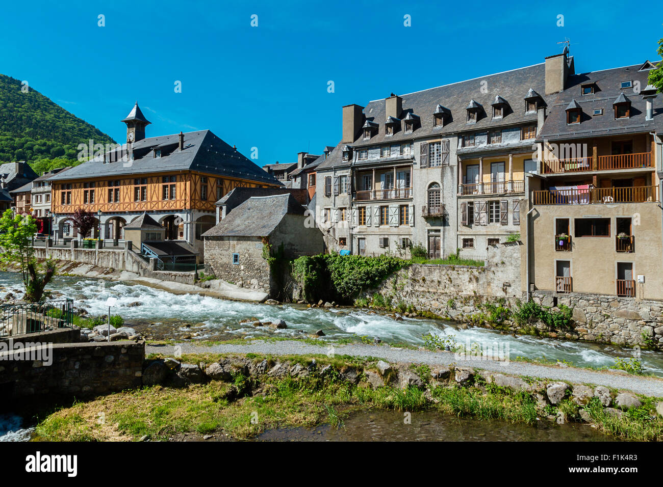 The city hall and the River Aure at Arreau, Hautes Pyrenees, France Stock Photo