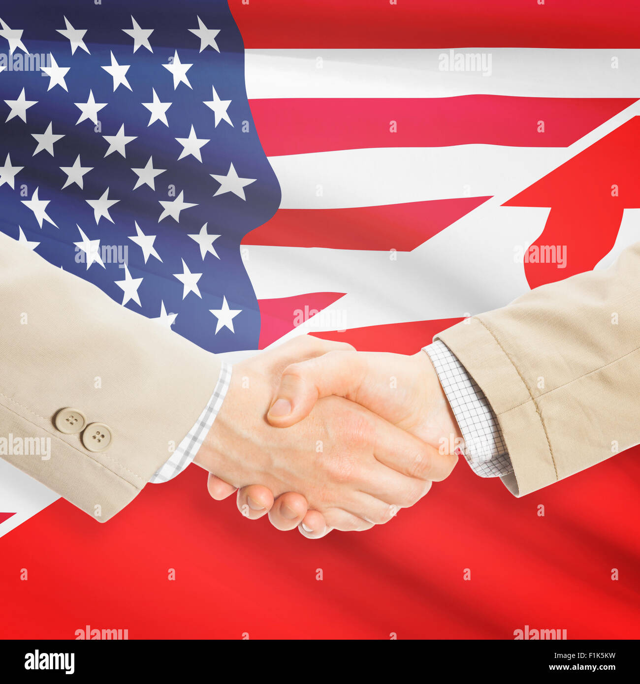 Businessmen shaking hands - United States and Tonga Stock Photo