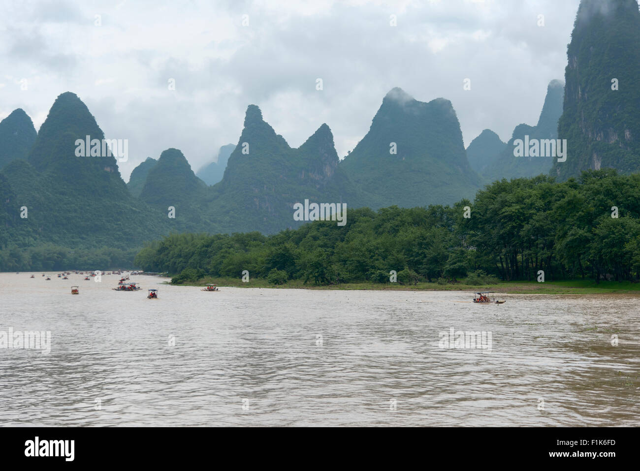 small boats and the cruise ships on Li river in China Stock Photo