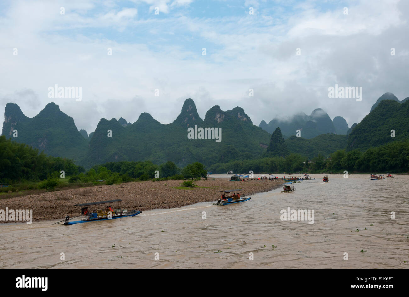 small boats and the cruise ships on Li river in China Stock Photo