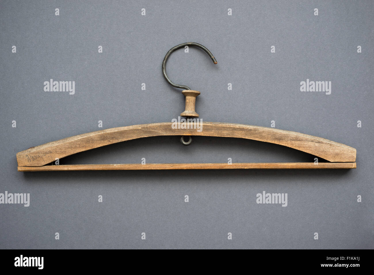 vintage wooden hanger isolated on gray Stock Photo