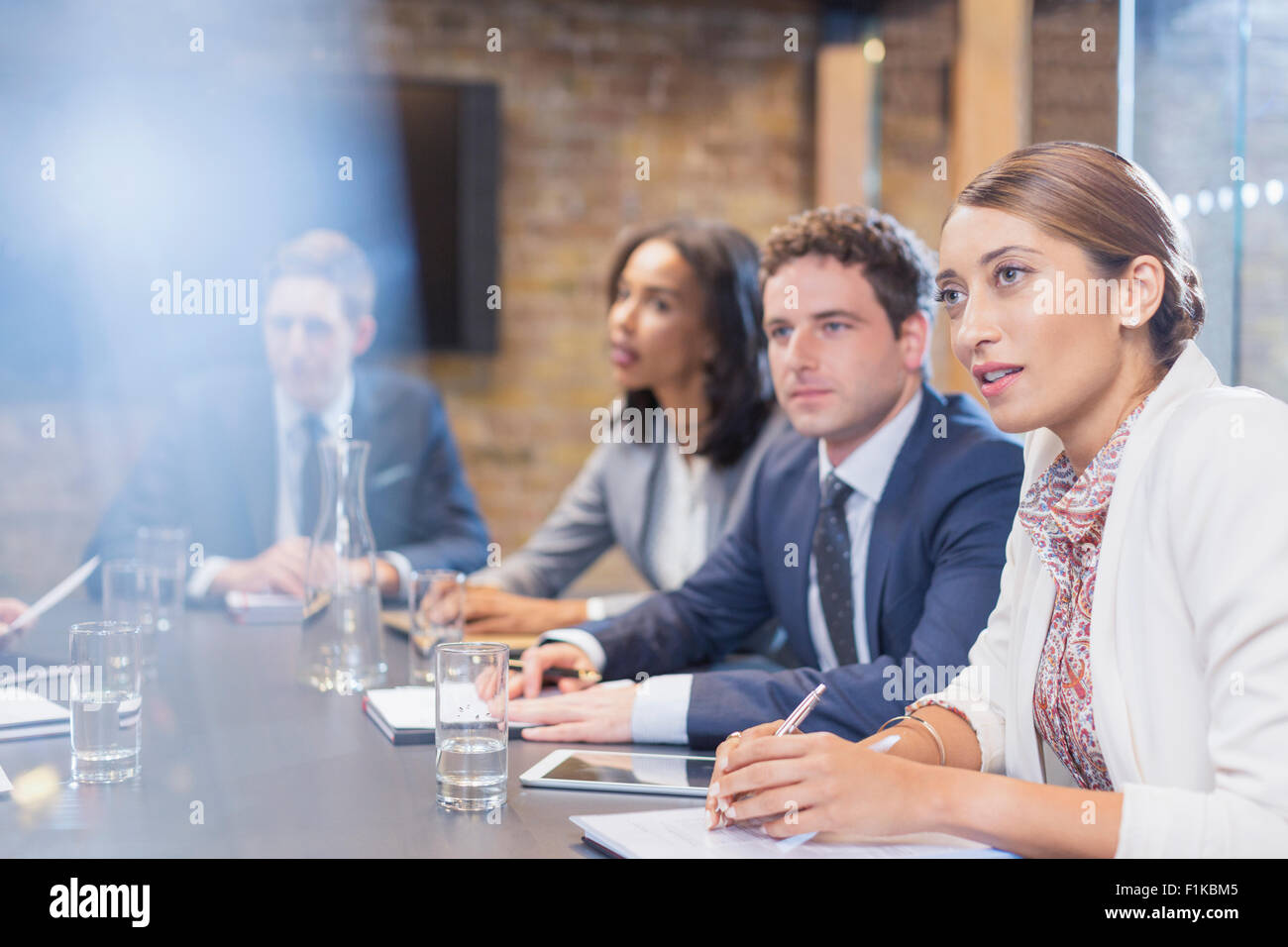 Attentive business people in conference room meeting Stock Photo
