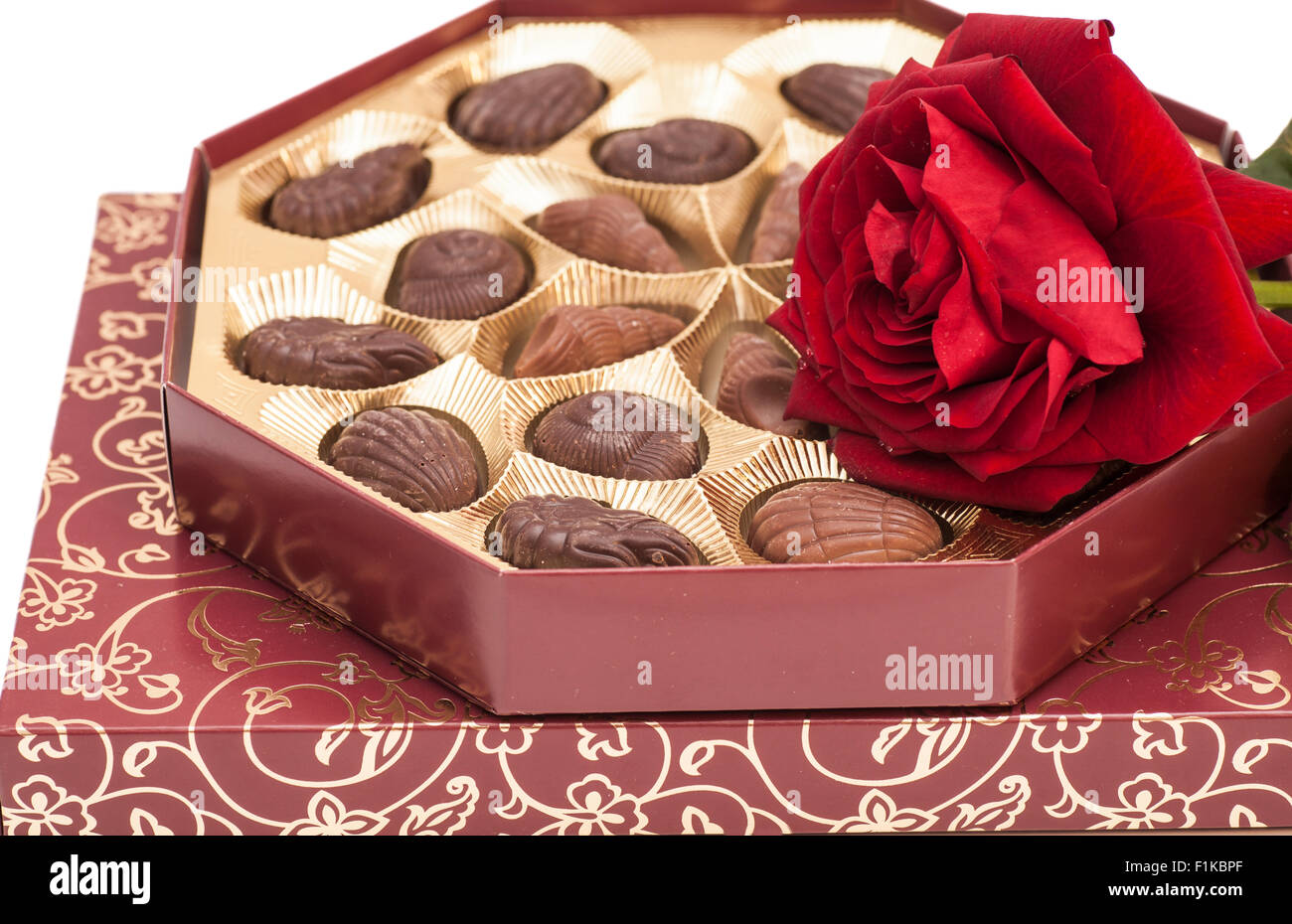 chocolate boxes and red rose Stock Photo Alamy