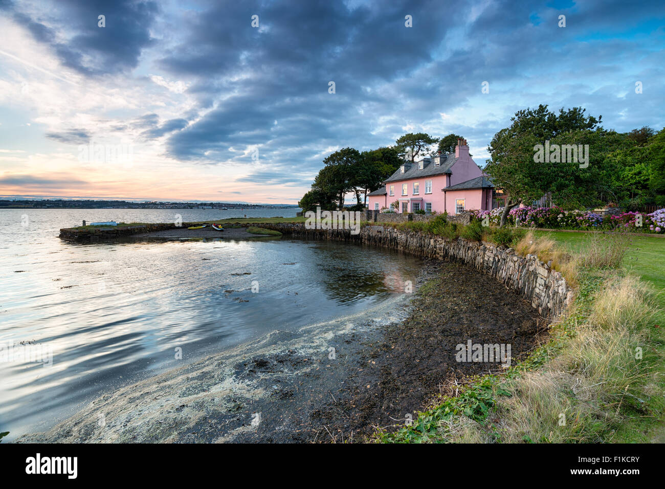 Sunset at Empacombe Quay on the South West Coast Path near Mount Edgcumbe in Cornwall Stock Photo