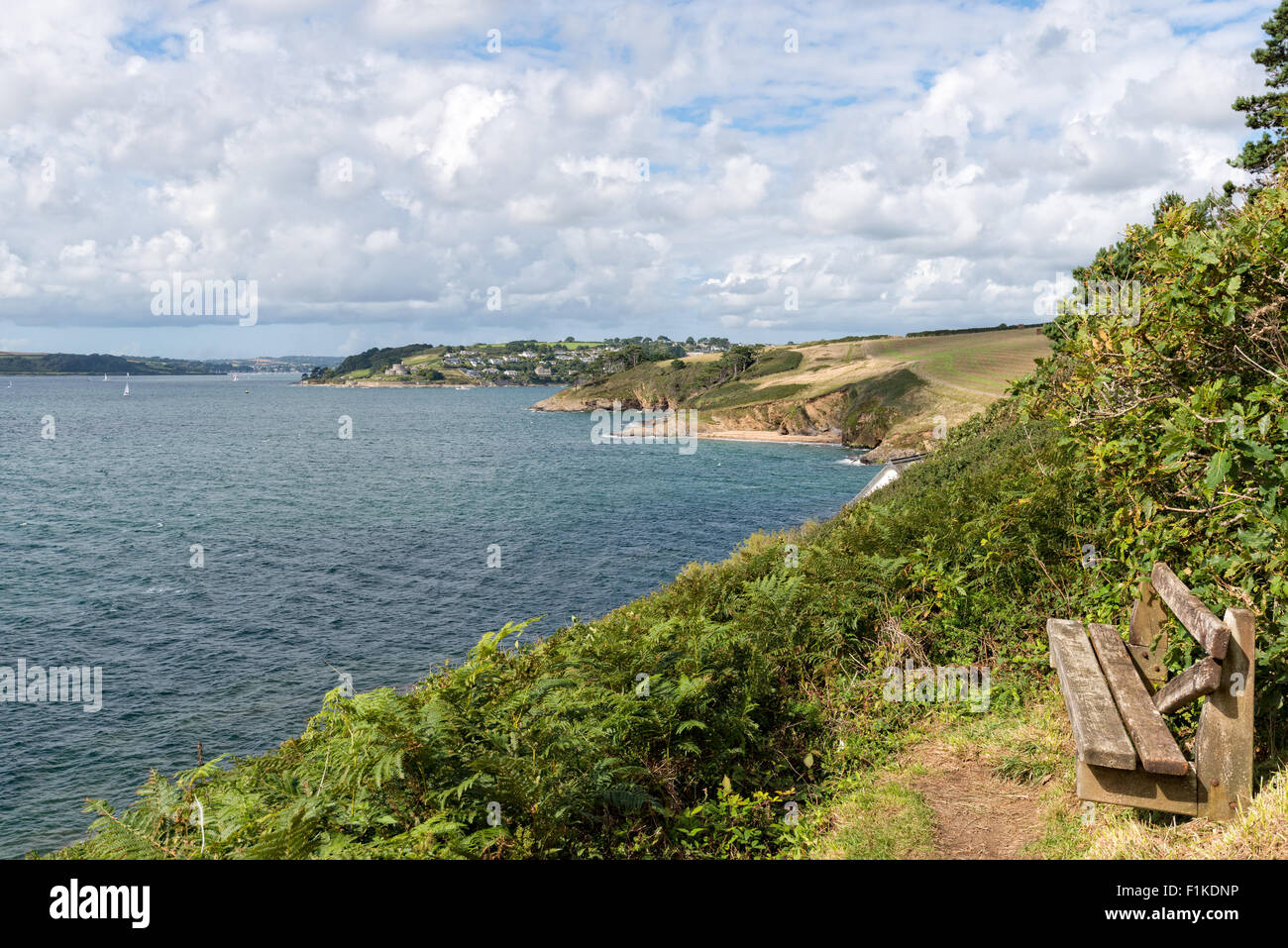St Anthony Head on the Roseland Peninsula in Cornwall with St Mawes Castle in the far distance Stock Photo