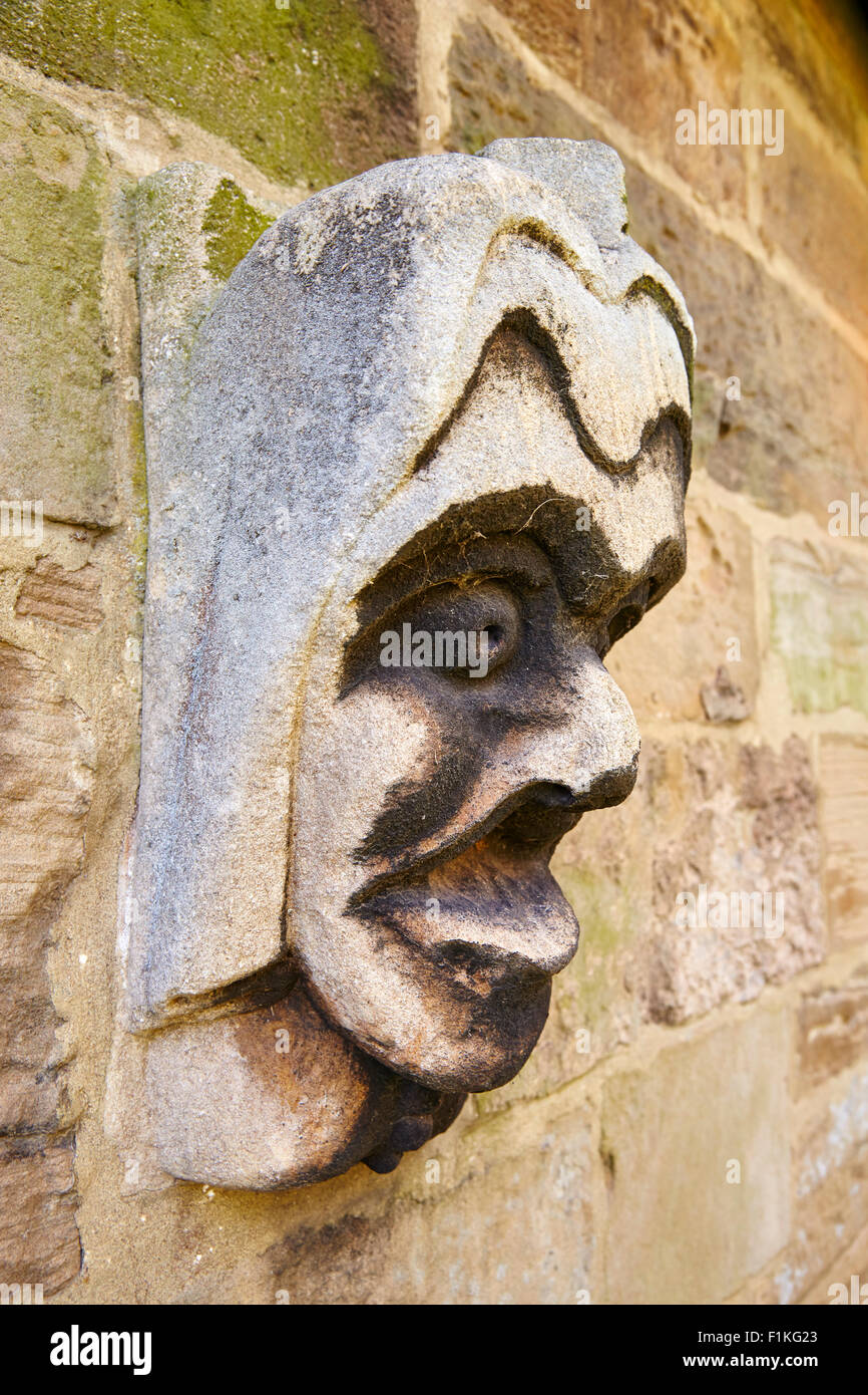 Carved stone heads on the Archbishop's Palace in Southwell, Nottinghamshire, England, UK. Stock Photo