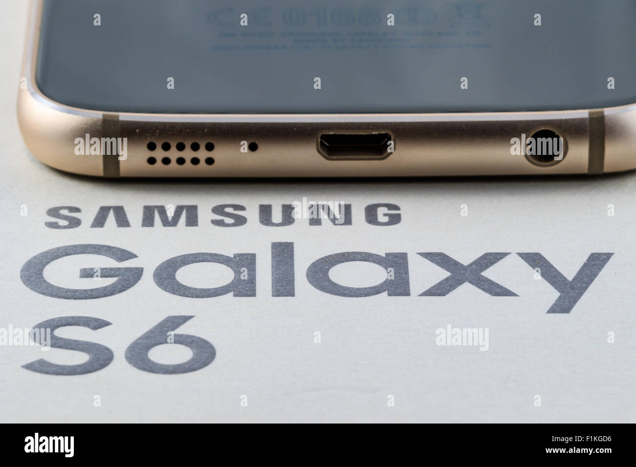 Bottom edge of Samsung Galaxy S6 gold platinum 64 gb edition Stock Photo