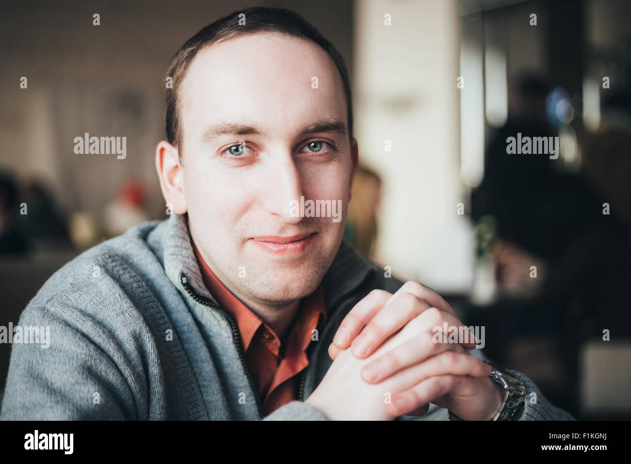 Handsome Casual, Caucasian Thinking Man Sitting In Cafe Stock Photo