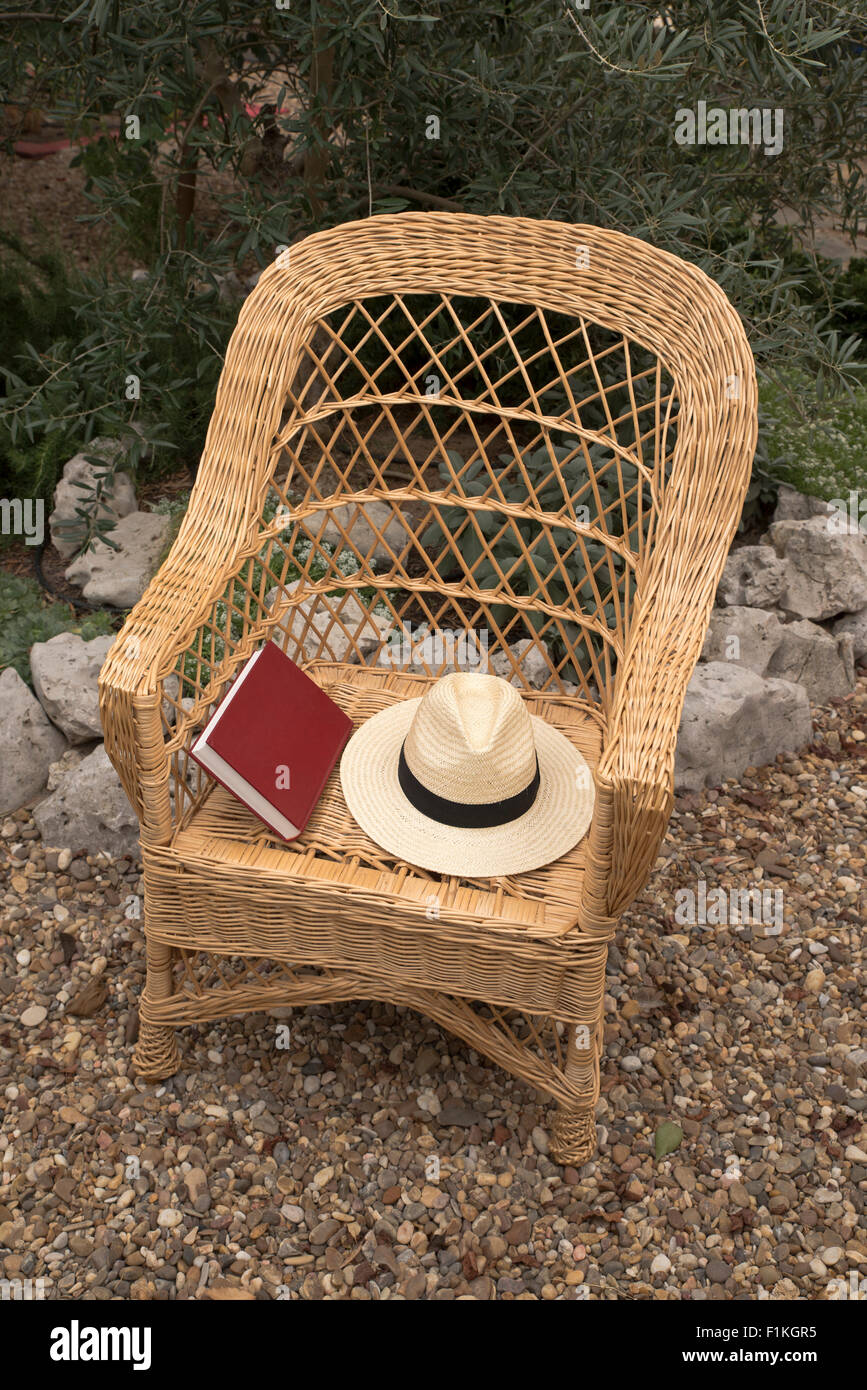 straw chair in a garden Stock Photo Alamy