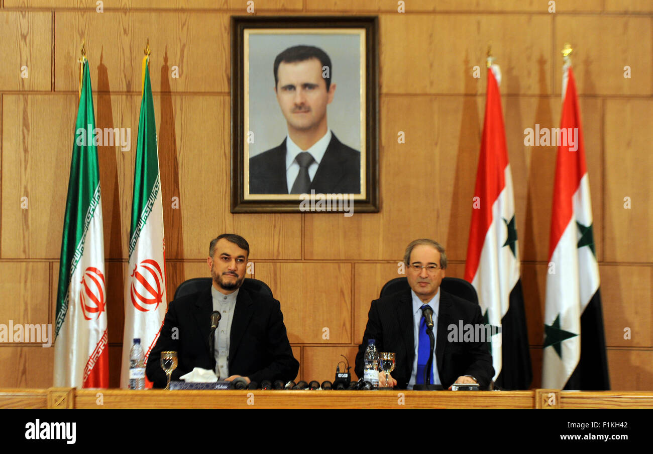 Damascus, Syria. 3rd Sep, 2015. Syrian Deputy Foreign Minister Faisal Mekdad (R) and visiting Iranian Deputy Foreign Minister Hussein Abdul Lahyan attend a joint press conference in Damascus, capital of Syria, on Sept. 3, 2015. Visiting Iranian Deputy Foreign Minister Hussein Abdul Lahyan said Thursday that the Syrian leadership has welcomed an initiative proposed recently by Tehran to help bring a political end to the long-running Syrian conflict. © Zhang Naijie/Xinhua/Alamy Live News Stock Photo