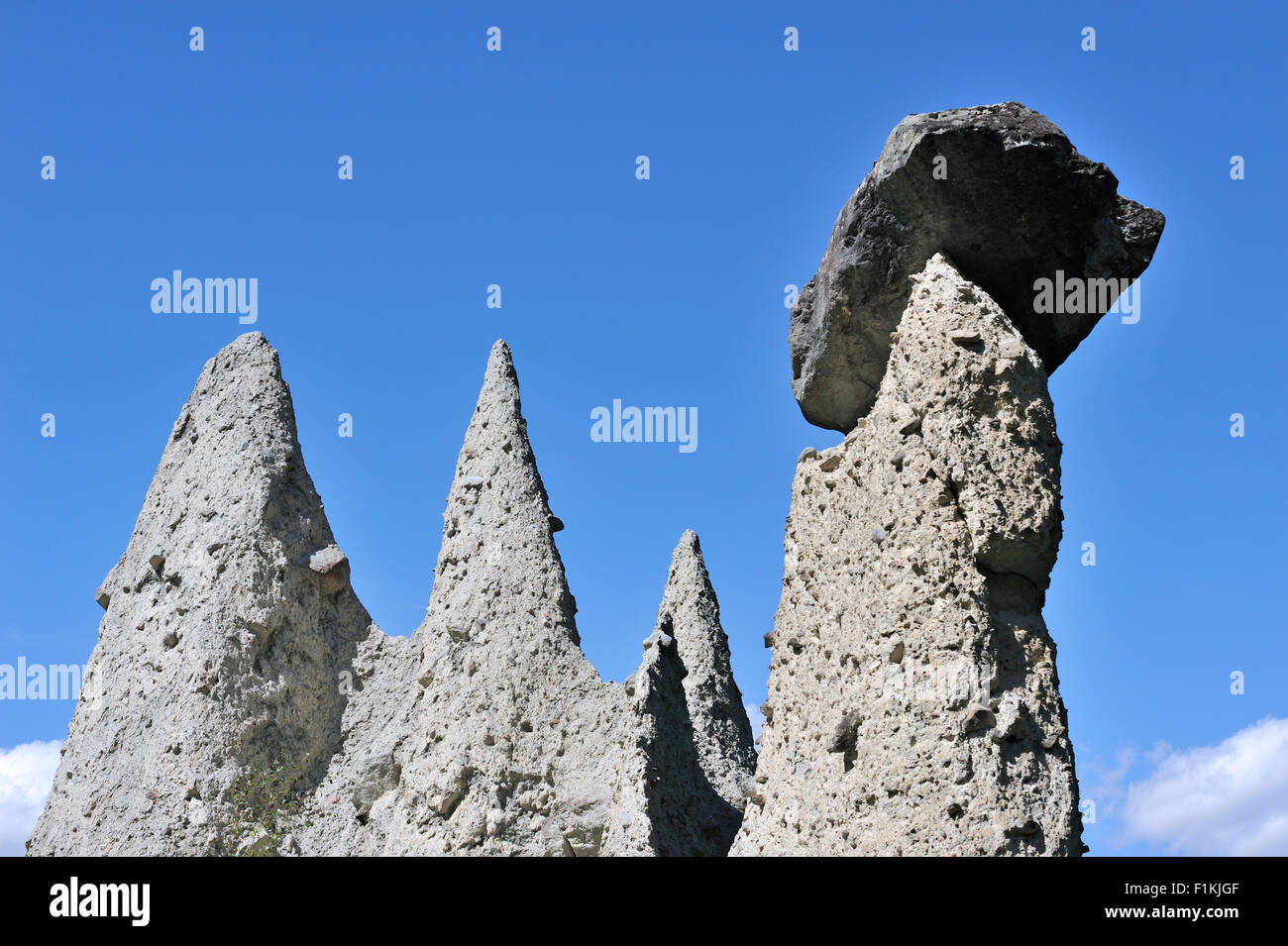 Pyramids of Euseigne, Valais / Wallis, Switzerland. Rocks of harder stone stacked on top protect the columns from rapid erosion Stock Photo