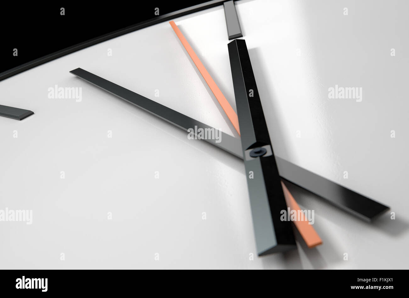 An extreme close up of a modern simplistic watch face on an isolated studio background Stock Photo