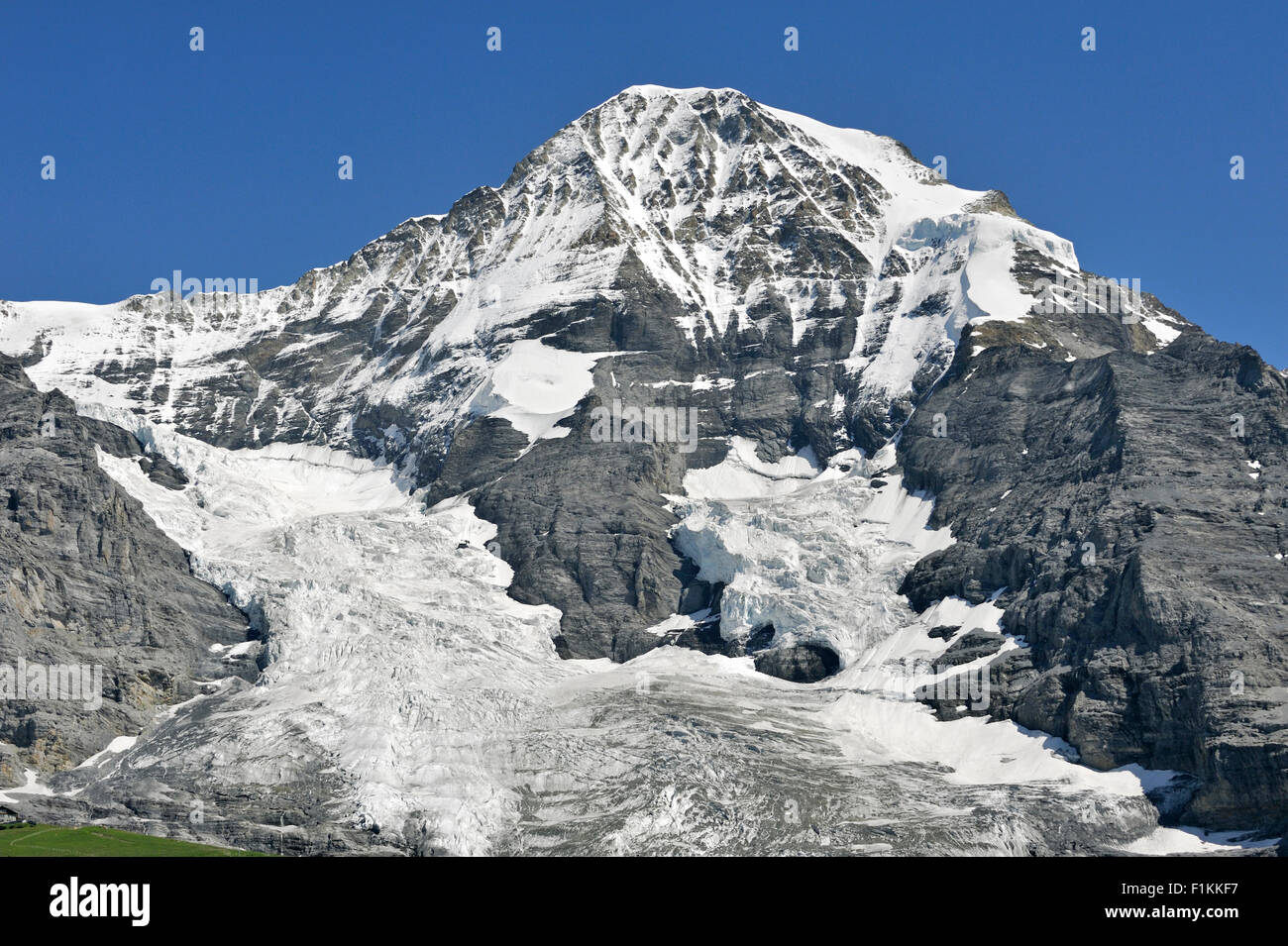 North face of the Mönch, forms part of a mountain ridge between the Jungfrau and the Eiger in the Bernese Alps, Switzerland Stock Photo
