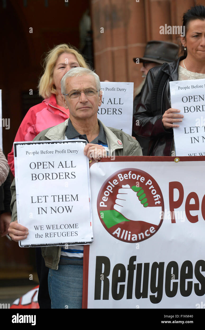 Londonderry, Northern Ireland, UK. 3rd September, 2015. Pro-refugee vigil held in Londonderry, Northern Ireland – 03 September 2015. Hundreds of people attend a vigil at the Guildhall Square in Londonderry demanding that the European Union open its borders and let in refugees fleeing war-torn regions of the Middle East and Africa. The demonstration was organised by People Before Profit and supported by the NI Council for Ethnic Minorities and Unison. Credit: George Sweeney / Alamy Live News Stock Photo