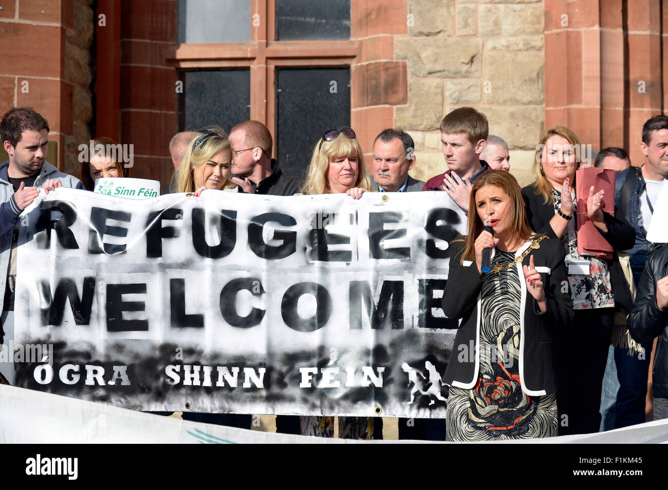 Londonderry, Northern Ireland, UK. 3rd September, 2015. Pro-refugee vigil held in Londonderry, Northern Ireland – 03 September 2015. Elisha McCallion, Mayor of Derry) speaking at a vigil at the Guildhall Square in Londonderry demanding that the European Union open its borders and let in refugees fleeing war-torn regions of the Middle East and Africa. The demonstration was organised by People Before Profit and supported by the NI Council for Ethnic Minorities and Unison. Credit: George Sweeney / Alamy Live News Stock Photo