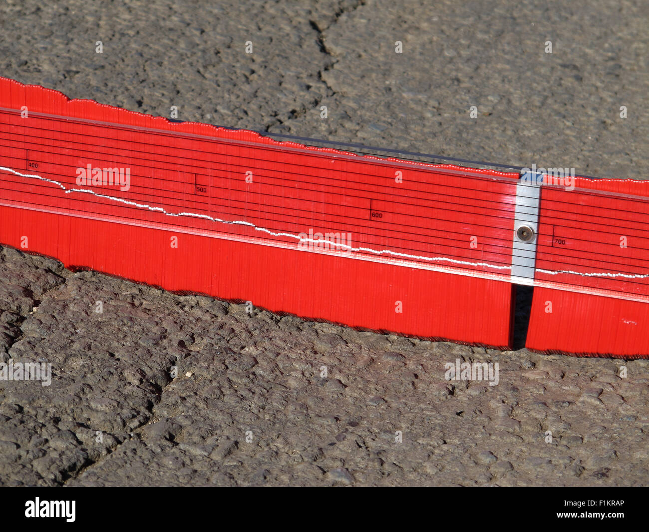 Road profiling gauge, contours, road surface sunken, subsidence  measure, across all planes centres, contour gauge, graduation levels, tarmac, profile Stock Photo