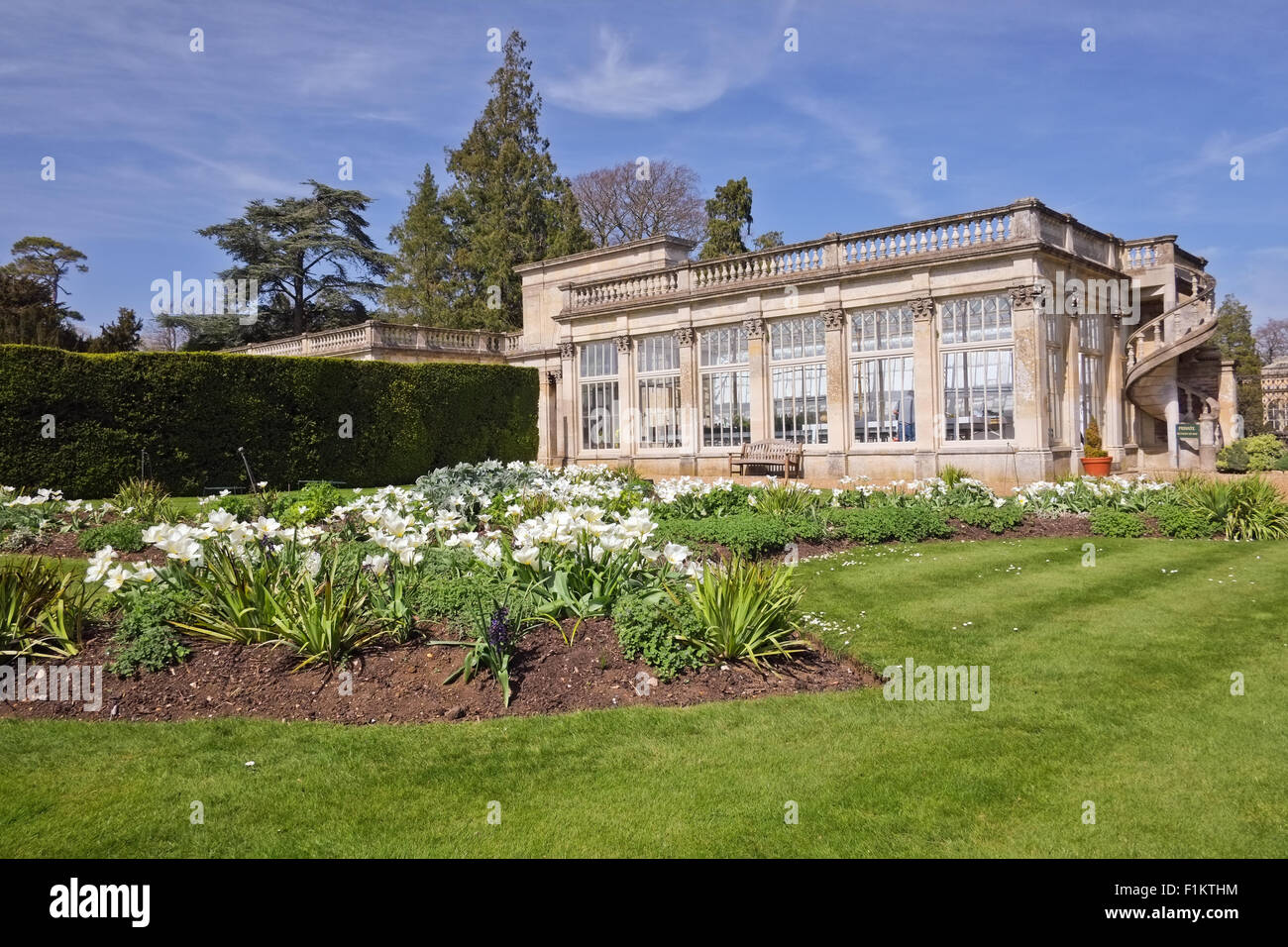 Planted borders in stately home garden at Castle Ashby Northamptonshire  UK Stock Photo