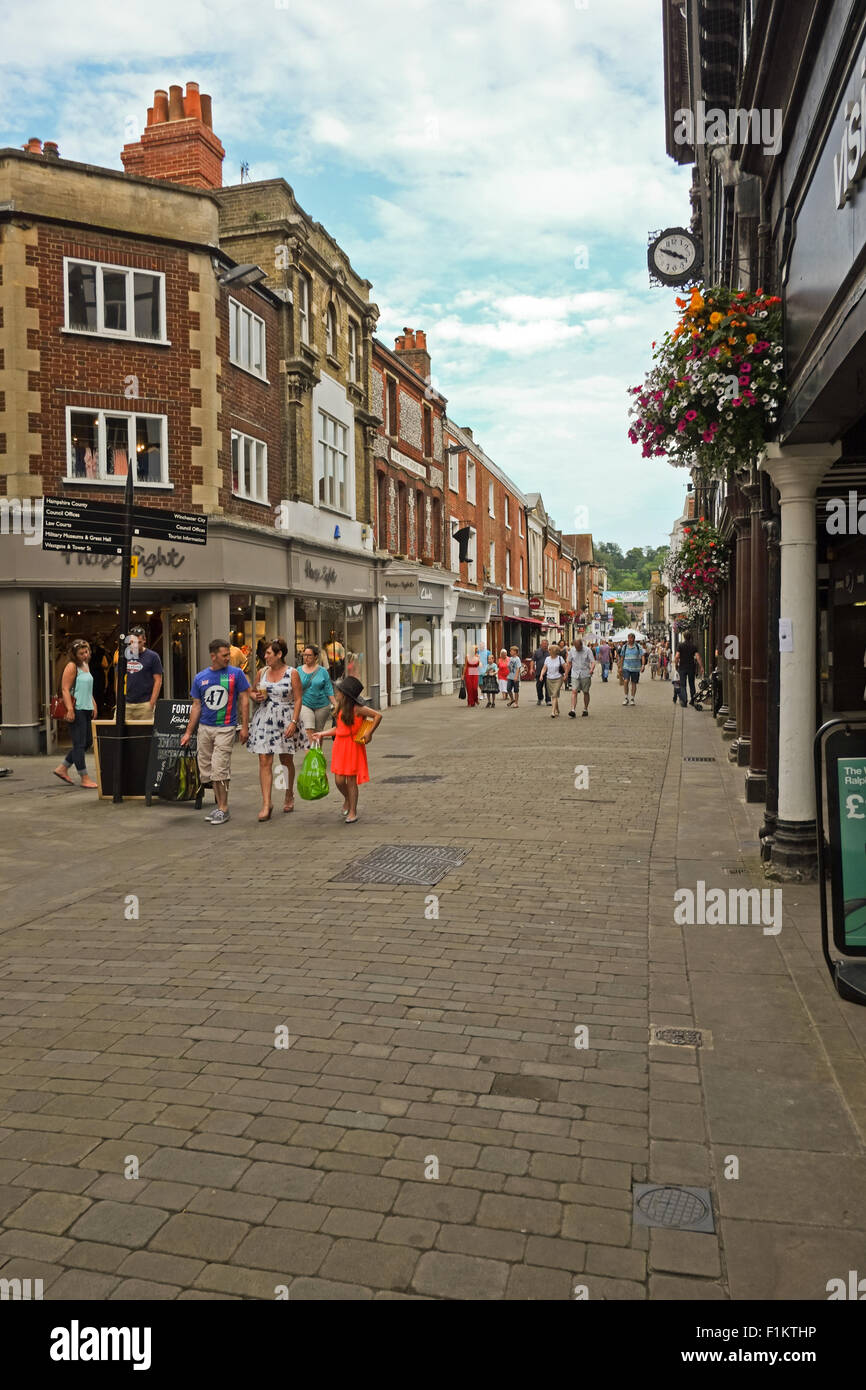 People shopping in the Town of Winchester Hampshire United Kingdom Stock Photo