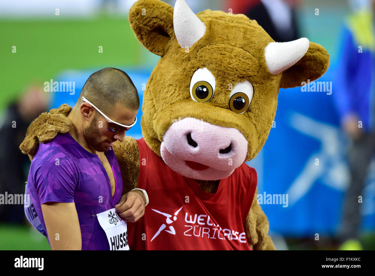 Zurich, Switzerland. 03rd Sep, 2015. Meeting mascot Cooly hugs Swiss local idol Kariem Hussein (SUI) after he won the 400m hurdles race at the 2015 Zurich IAAF Diamond League athletics meeting. Credit:  Erik Tham/Alamy Live News Stock Photo