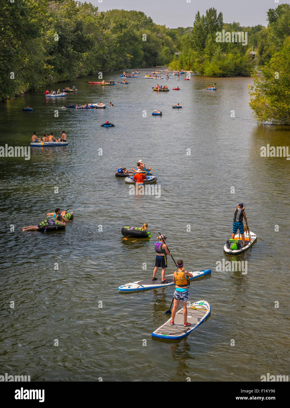 People floating the Boise River on a summer day. Boise Rver Greenbelt