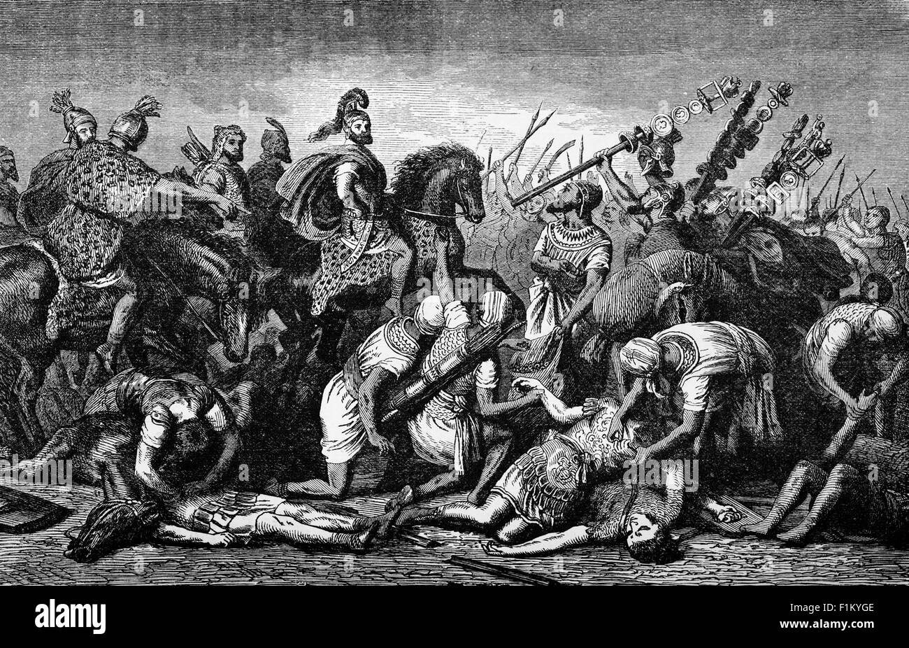 Troops of Hannibal Barca, the Punic Carthaginian military commander,  looting the dead. The Battle of Cannae was a key engagement of the Second Punic War between the Roman Republic and Carthage, fought in 216 BC near the ancient village of Cannae in Apulia, southeast Italy. The Carthaginians and their allies, led by Hannibal, surrounded and practically annihilated a larger Roman and Italian army under the consuls Lucius Aemilius Paullus and Gaius Terentius Varro. Stock Photo