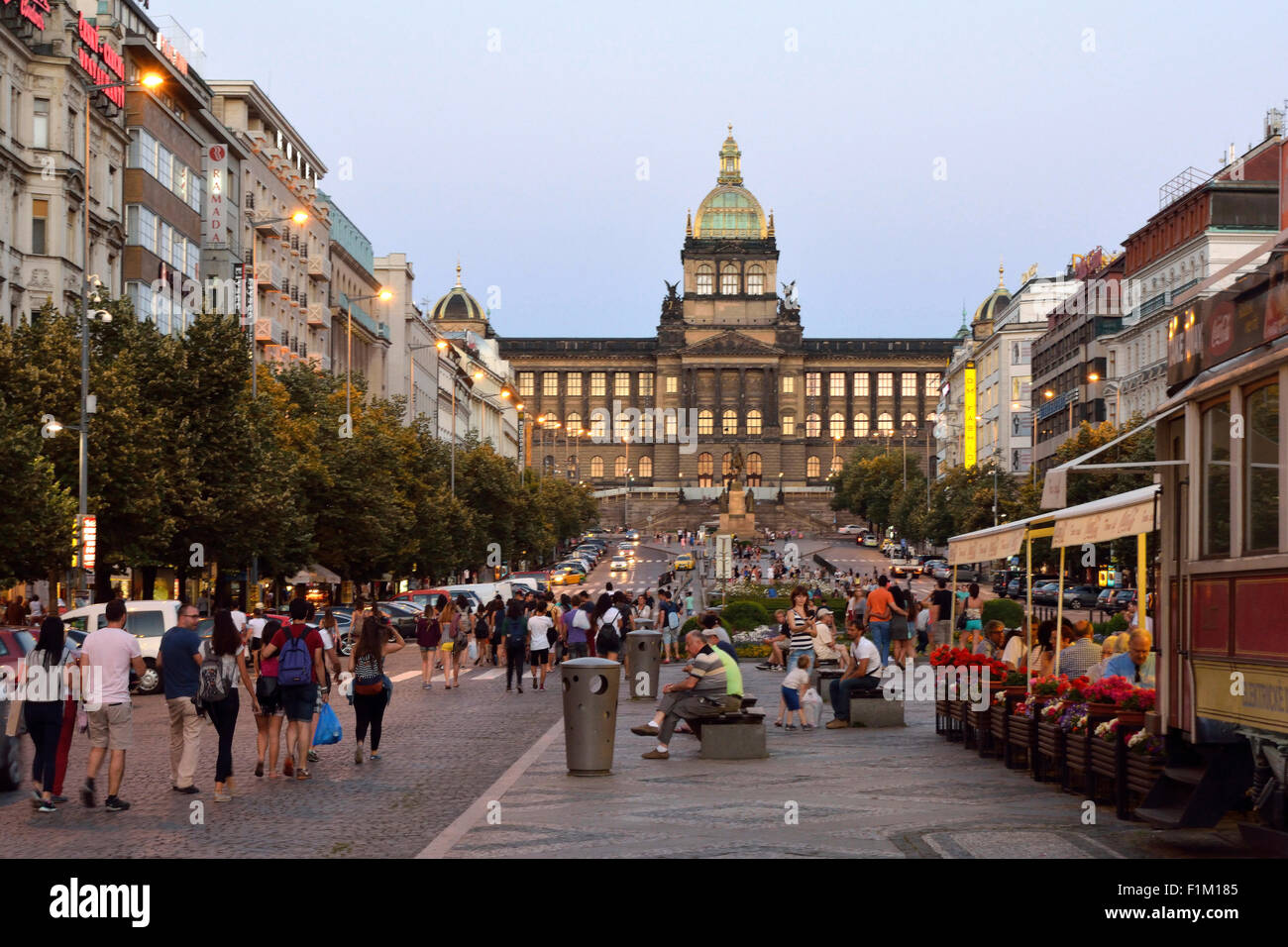People in the evening on Wenceslas Square in front of the National Museum in the historic center of Prague in the Czech Republic Stock Photo