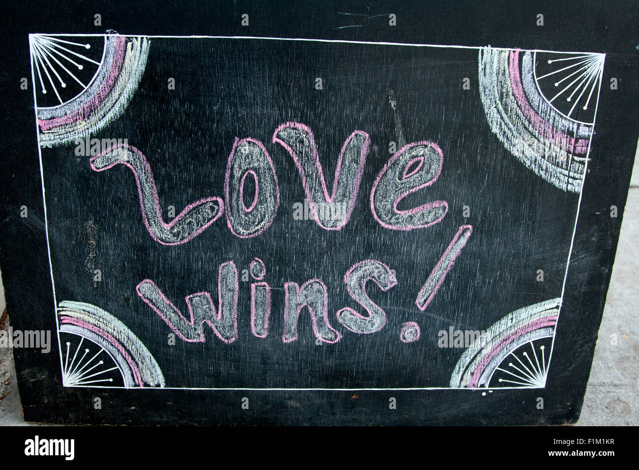 Chalkboard art on 24th Street in The Mission: 'Love Wins!' Stock Photo
