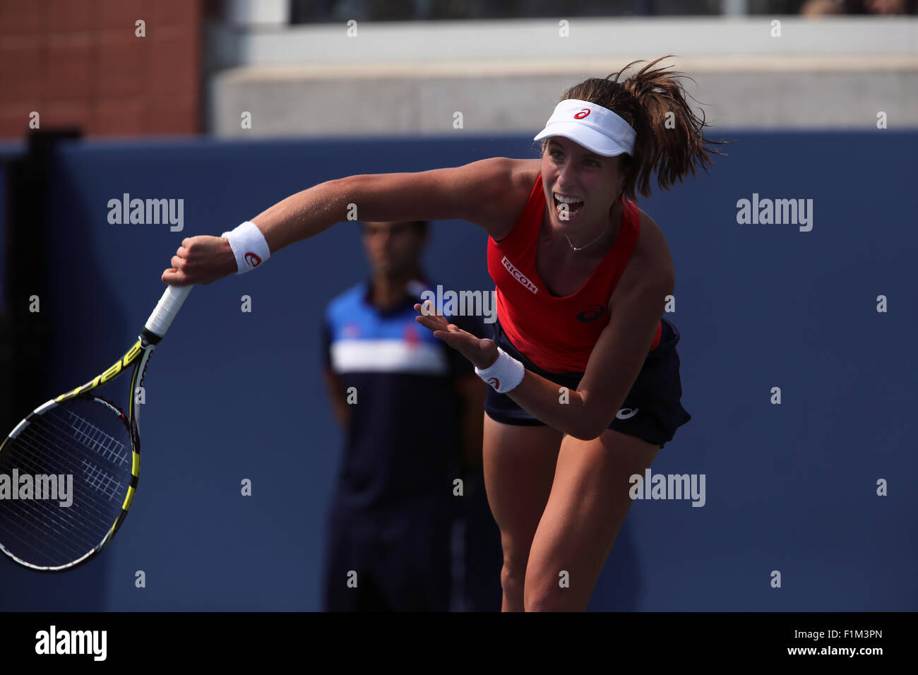 Britain's Johanna Konta en route to an upset  victory over Spain's Garbine Muguruza, the number 9 seed, during their second round match at the U.S. Open in Flushing Meadows, New York. Stock Photo