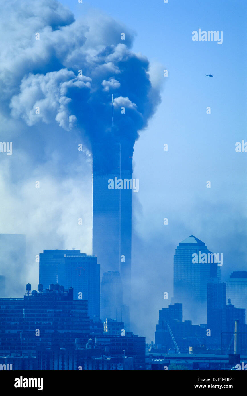 HISTORICAL SEPTEMBER 11 2001 WORLD TRADE CENTER ATTACK NEW YORK CITY USA 10.15 AM NORTH TOWER STANDS ALONE Stock Photo