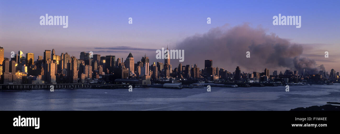 HISTORICAL SEPTEMBER 11 2001 TRADE CENTER ATTACK NEW YORK CITY USA  7.00 PM SMOKE FROM COLLAPSE Stock Photo