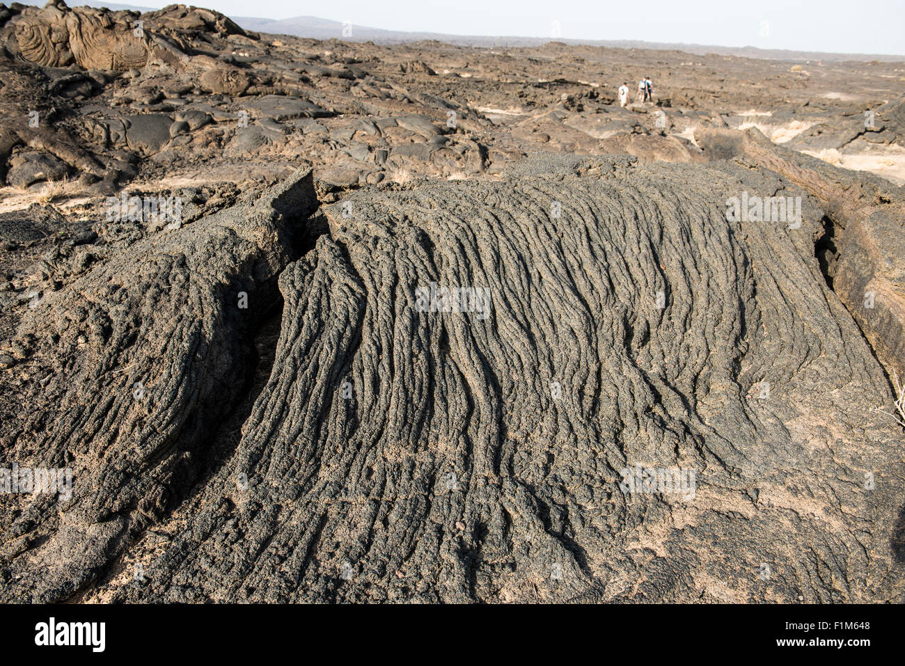 Rhyolite- A Volcanic rock (or lava) that characteristically is light in color in the Erta Ale volcanic crater. Stock Photo