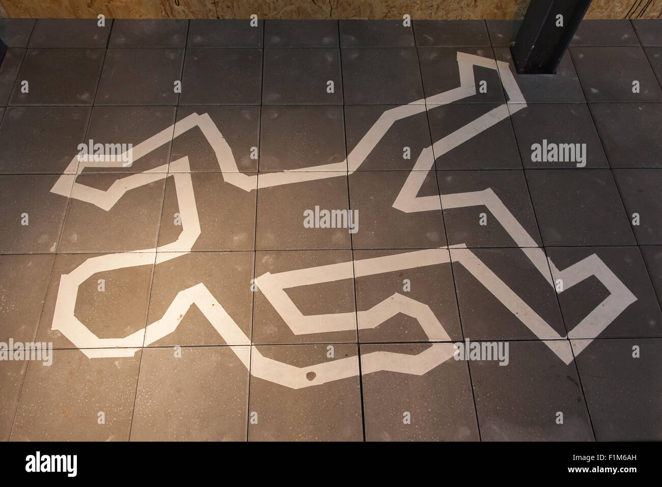 Crime scene chalk line of a body Stock Photo