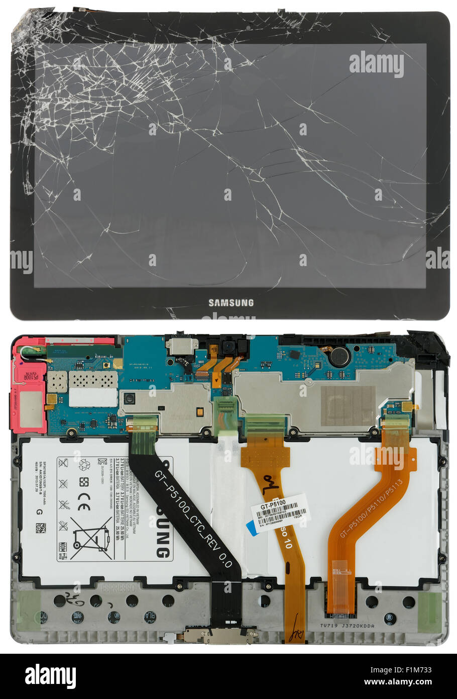 VILNIUS, LITHUANIA - AUGUST 13, 2015: Small Samsung tablet computer with the broken screen.  Isolated. In 2014 more than 60 mill Stock Photo