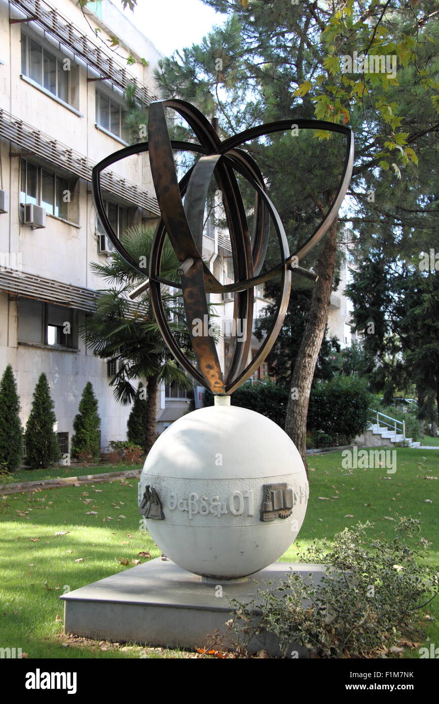 Unidentified sculpture (Greek reads '∂aβδξμ 01') outside the National Licensing Centre, Rruga Papa Gjon Pali II, Tirana, Albania, Balkans, Europe Stock Photo