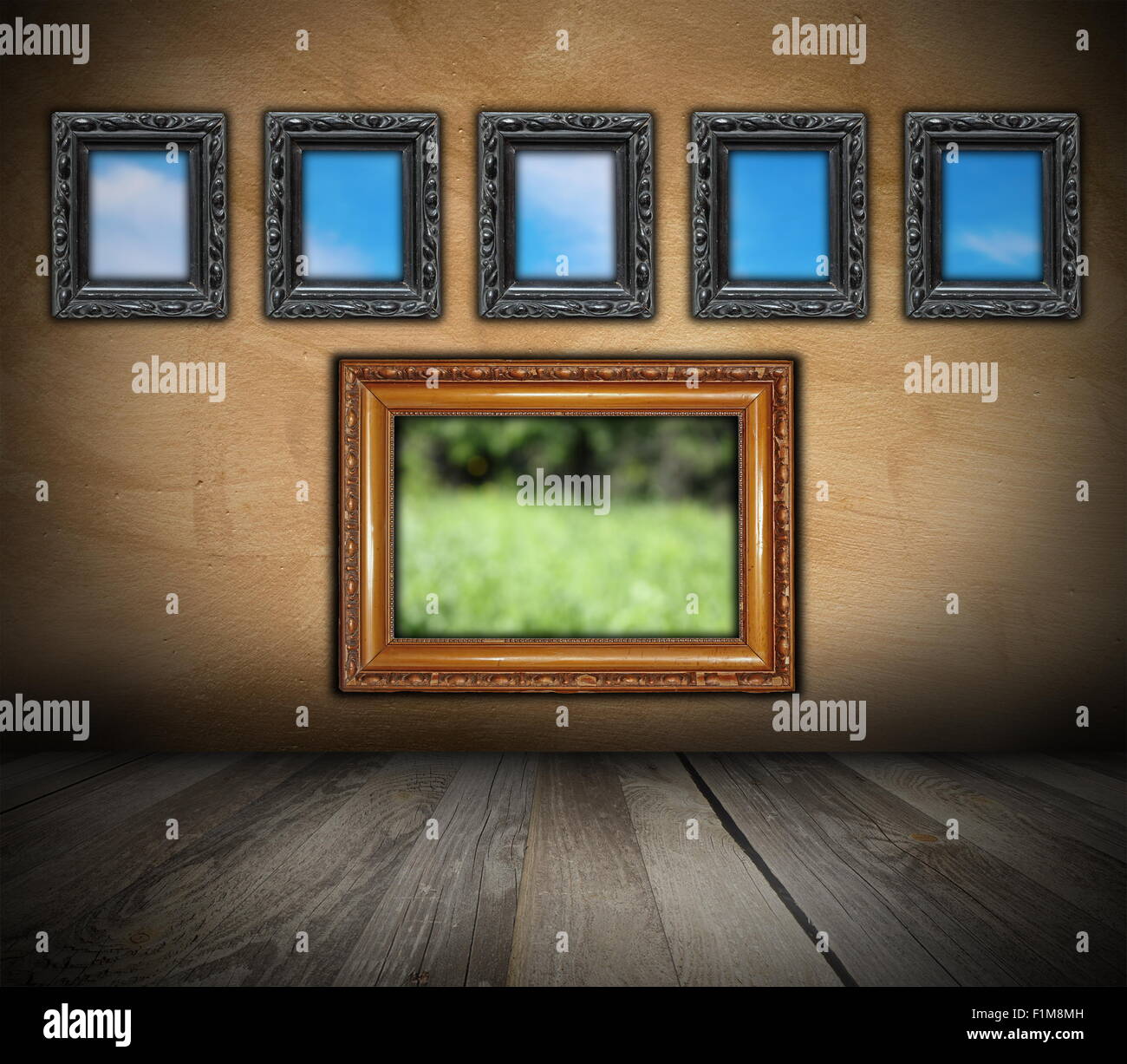 vintage interior backdrop with ancient wooden frames on grunge wall for your design Stock Photo